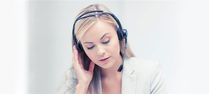 Customer service staff member on a phone call